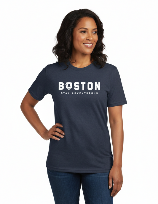 A person wearing a navy T-shirt with the text 'BOSTON' in white.