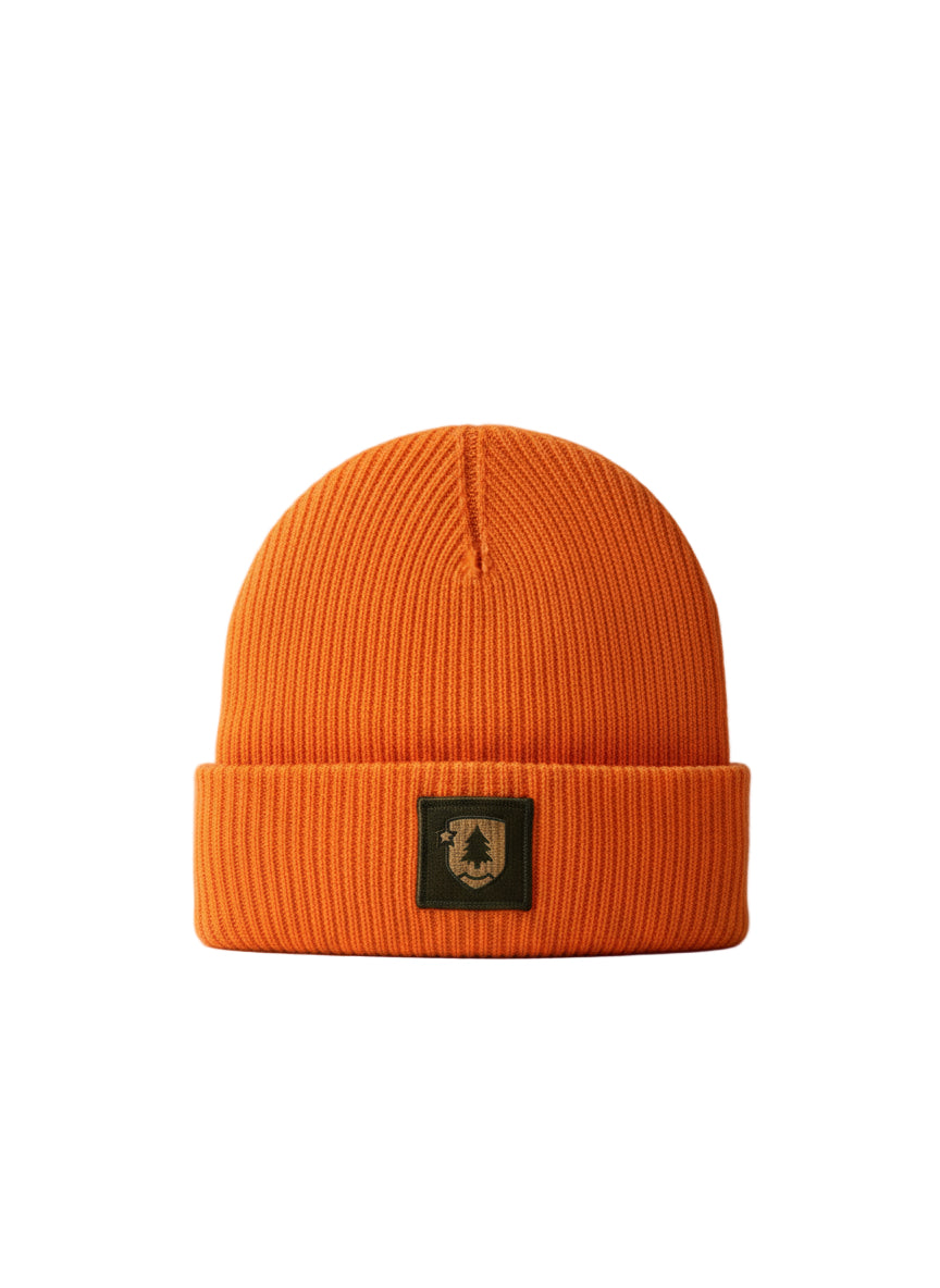 Orange beanie with a logo patch on a light gray background