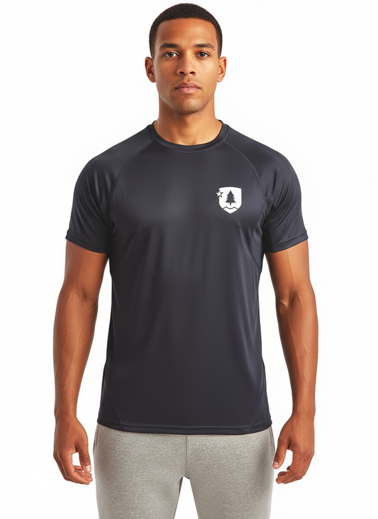 A male model wearing a navy blue performance t-shirt with a small logo on the chest, designed with sustainability in mind.