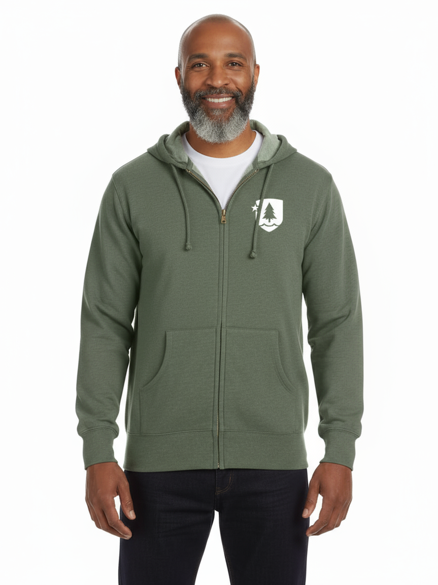 Man wearing a green hoodie with a logo on a white background