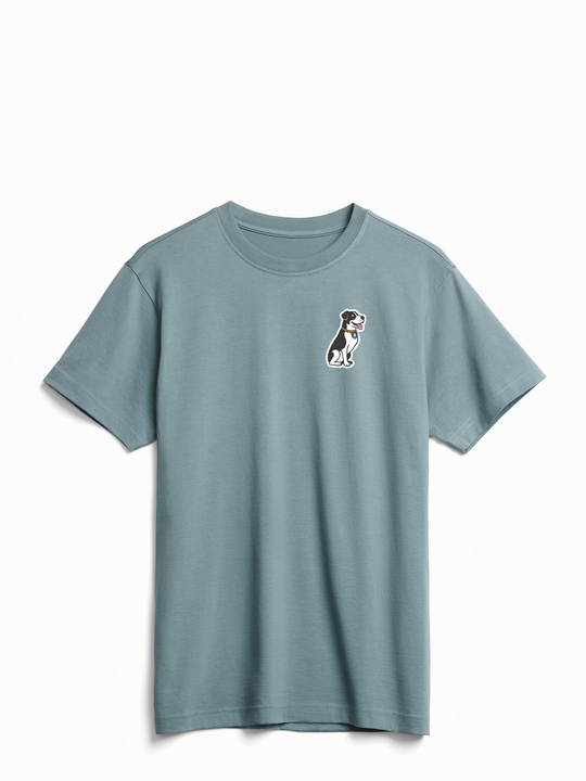 Light blue t-shirt with a small dog graphic on a white background