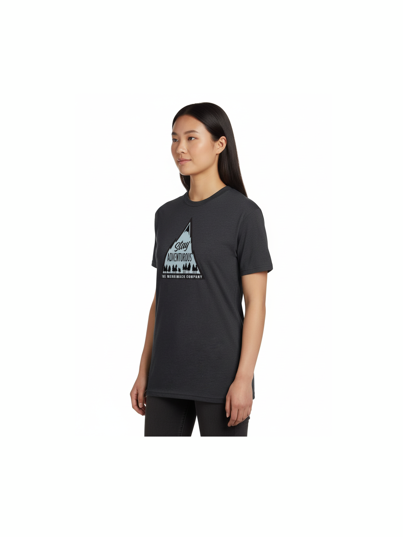 Woman wearing a black t-shirt with a graphic design on a light blue background