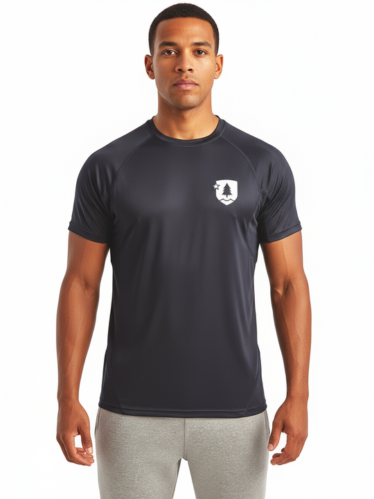 A male model wearing a navy blue performance t-shirt with a small logo on the chest, designed with sustainability in mind.