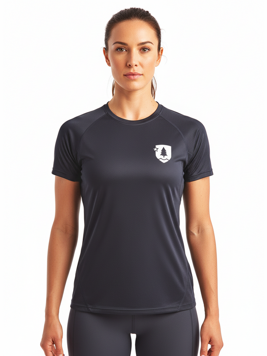 Woman wearing a black athletic shirt with a logo on a white background