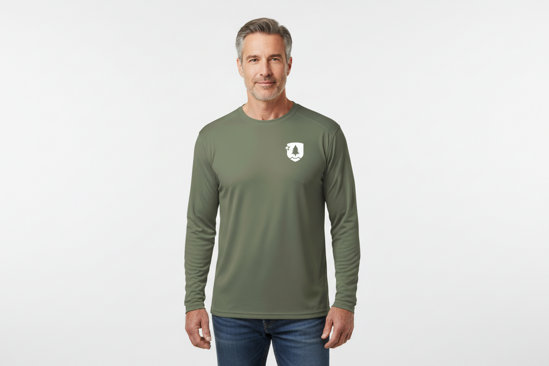 Man wearing a green long-sleeve shirt with a logo on a white background